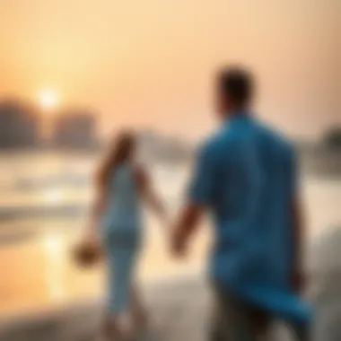 A serene beach setting with a couple enjoying a sunset stroll