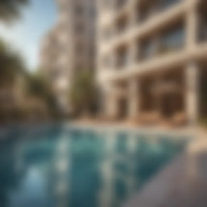 A serene pool area at a hotel apartment complex emphasizing relaxation